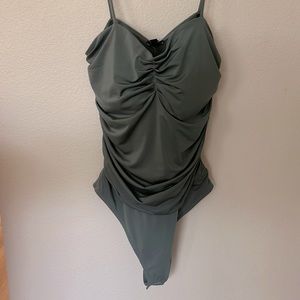 Express body suit size medium. I’ve only worn it a few times. Super flattering.